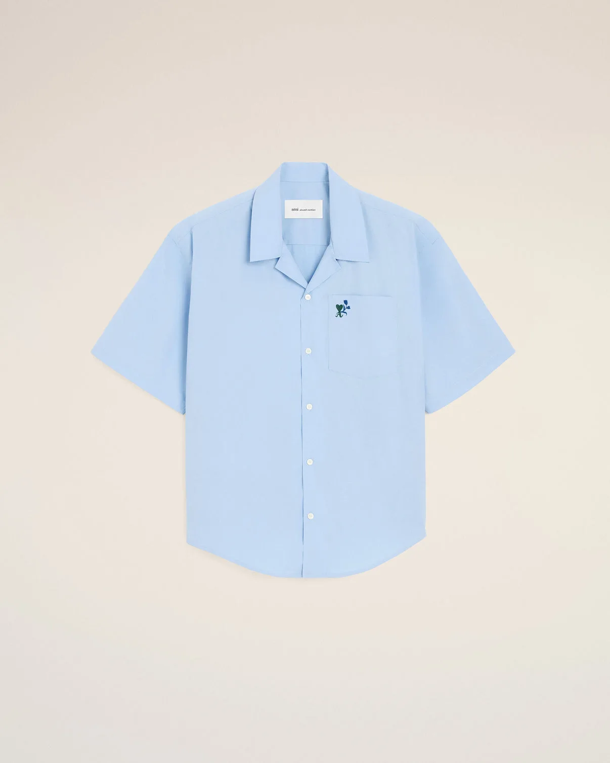 Blue boxy cotton short-sleeve shirt with tulip