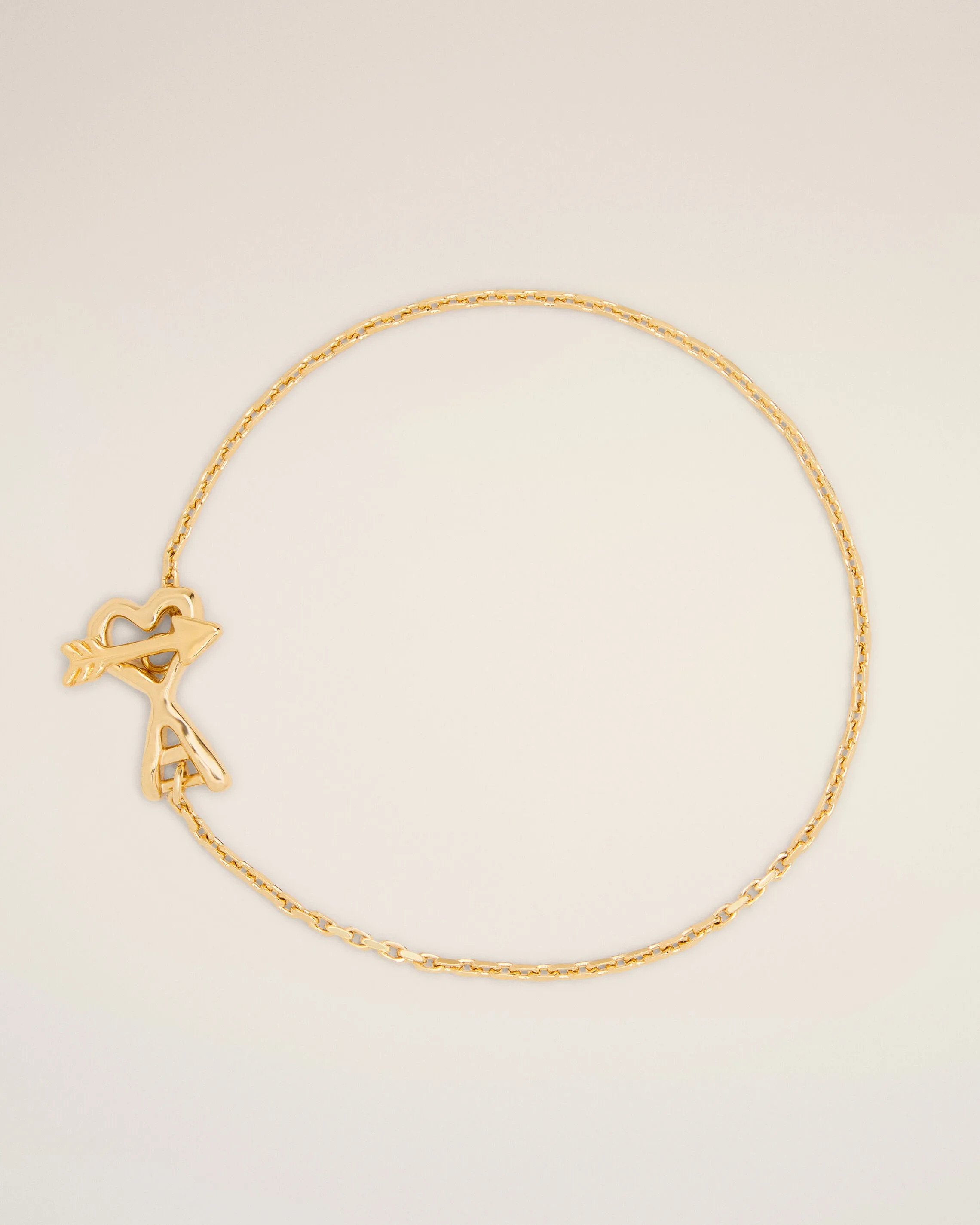 Gold brass bracelet with hammered heart arrow