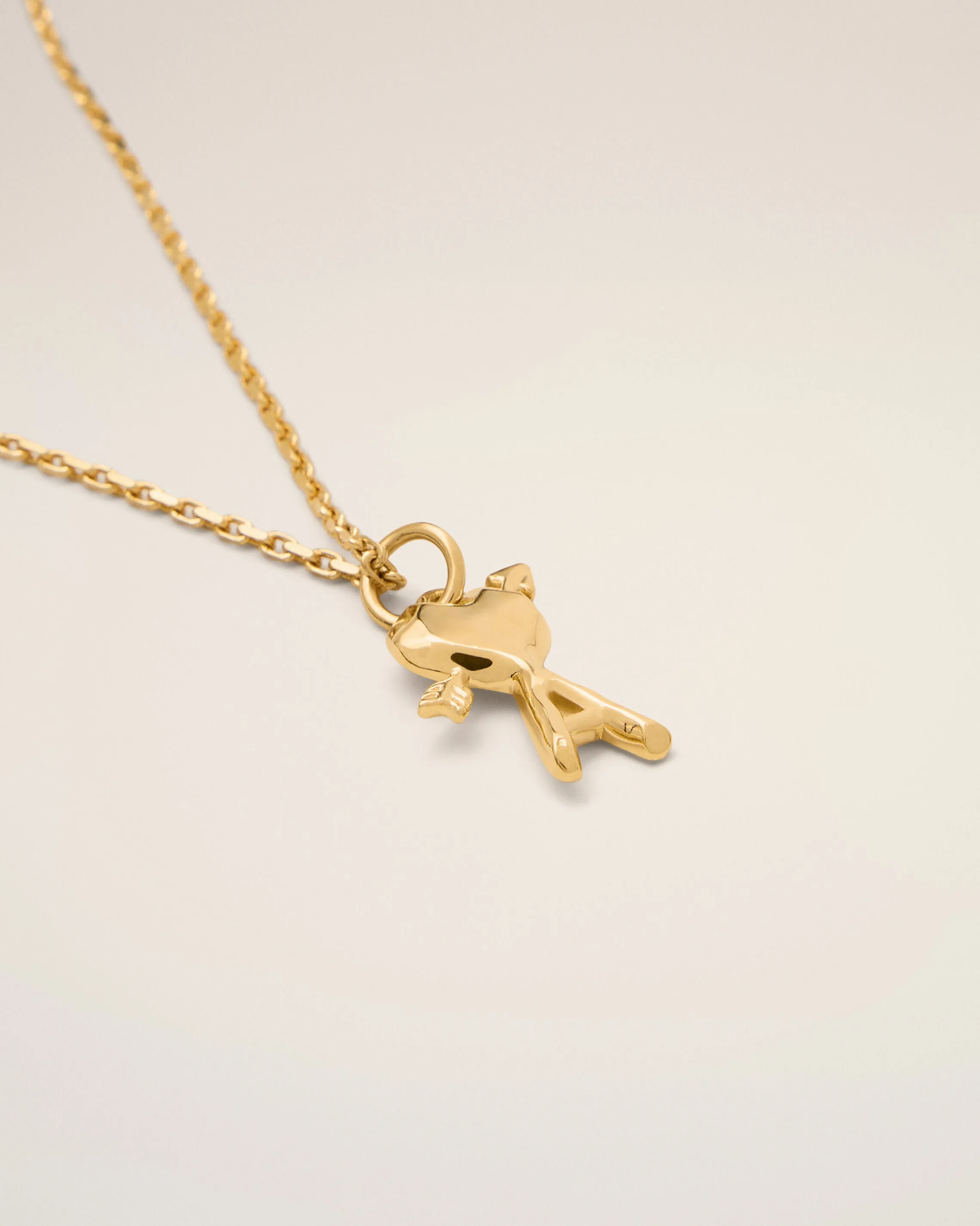 Gold brass necklace with hammered heart arrow